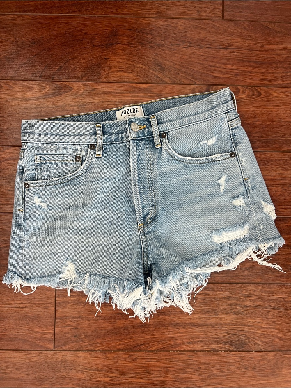 Agolde Light Wash Distressed Denim Cutoff Shorts